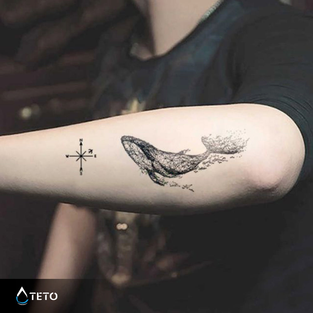Tatuaje de una cola de ballena.